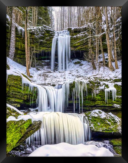 Tranquil Winter Waterfalls Framed Print by Roger Mechan