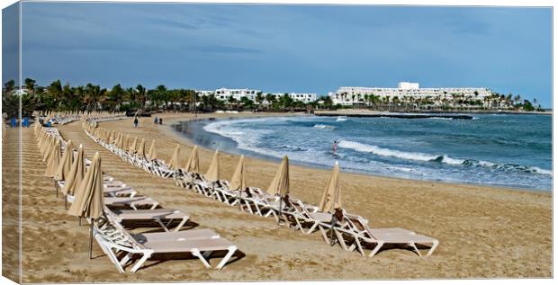 Beach at Costa Teguise Canvas Print by Joyce Storey