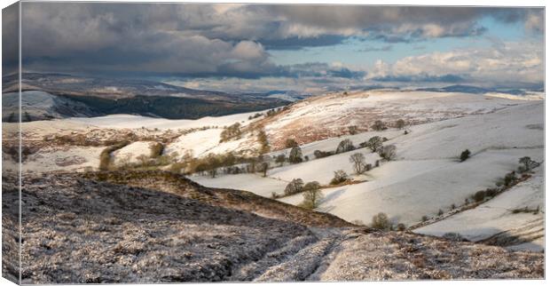 Snowy mountains Canvas Print by Clive Ashton