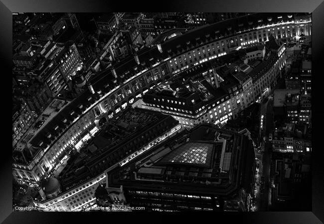 Aerial illuminated London view retail buildings Framed Print by Spotmatik 
