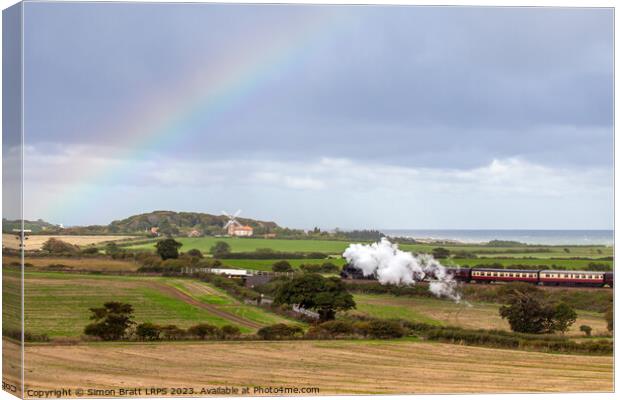 Norfolk steam train and Weybourne windmill rainbow Canvas Print by Simon Bratt LRPS