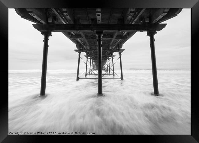 Under the pier at Saltburn by the sea in North Yor Framed Print by Martin Williams