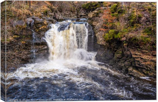 Falls of Falloch in winter Canvas Print by Angus McComiskey
