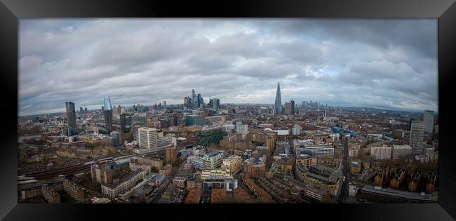 Over the rooftops of London - the famous city from above   Framed Print by Erik Lattwein