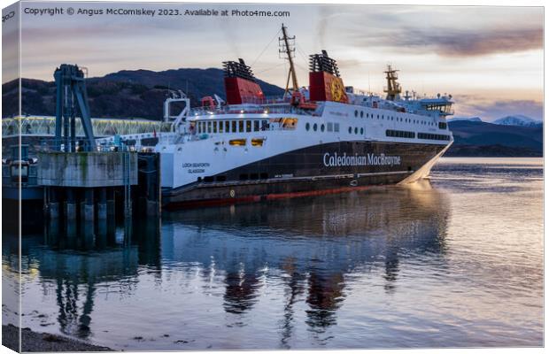 CalMac ferry in Ullapool harbour Canvas Print by Angus McComiskey