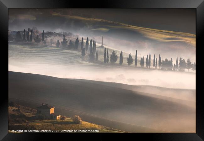 Foggy morning in Tuscany. Val d'Orcia, Pienza, Italy Framed Print by Stefano Orazzini