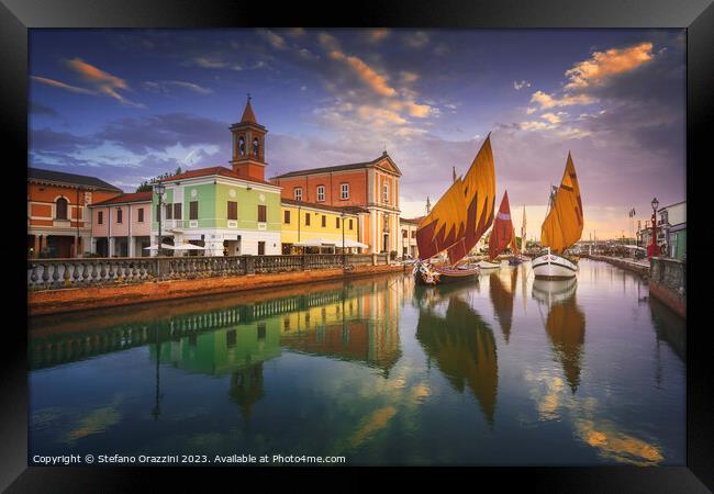 Cesenatico canal, historic sailboats and church. Romagna, Italy Framed Print by Stefano Orazzini