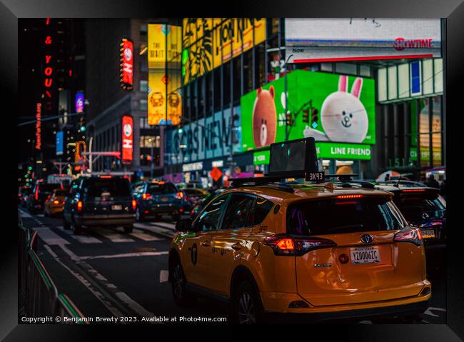 Times Square At Night  Framed Print by Benjamin Brewty
