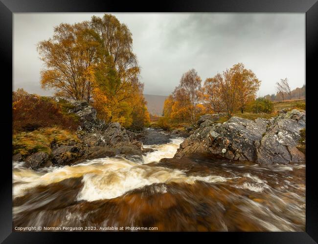 A waterfall in Autumn Framed Print by Norman Ferguson