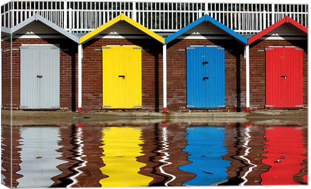 Swanage beach huts Canvas Print by Tony Bates