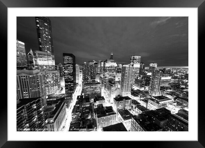 Aerial Chicago skyscrapers illuminated at night  Framed Mounted Print by Spotmatik 