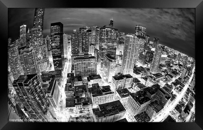 Aerial wide angle night view illuminated Chicago  Framed Print by Spotmatik 