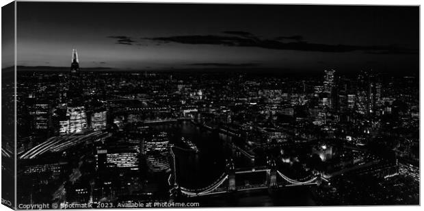 Panoramic Aerial night London view of Tower Bridge England Canvas Print by Spotmatik 