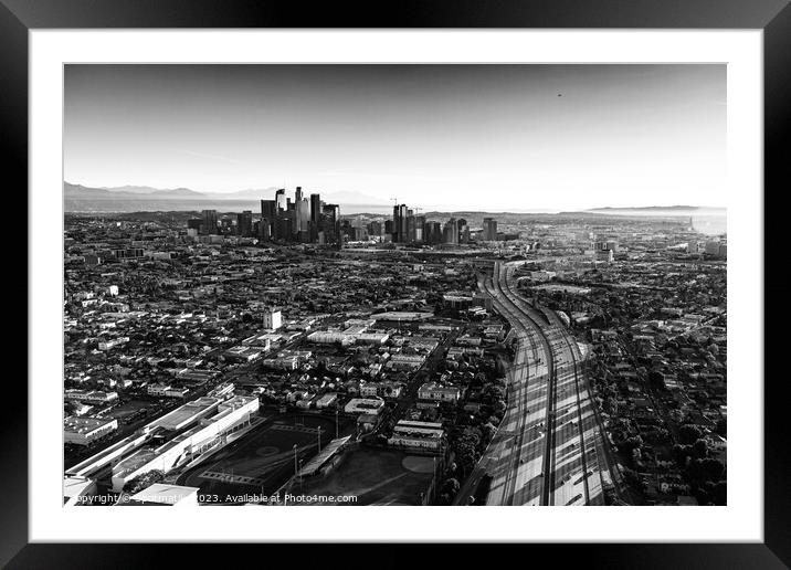 Aerial sunrise view downtown Los Angeles Freeway Framed Mounted Print by Spotmatik 