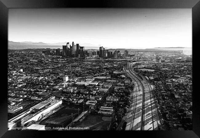 Aerial sunrise view downtown Los Angeles Freeway Framed Print by Spotmatik 
