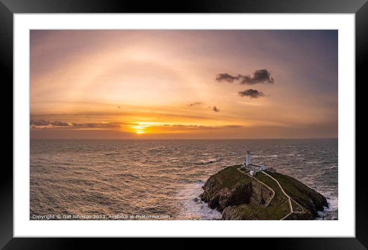 Rough weather off the lighthouse at sunset Isle of Anglesey Nort Framed Mounted Print by Gail Johnson