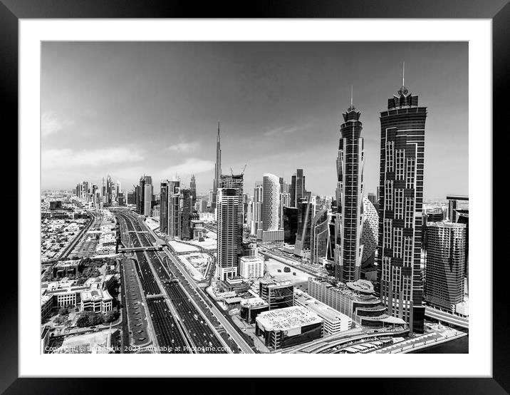 Aerial Dubai city skyscrapers Sheikh Zayed Road Framed Mounted Print by Spotmatik 