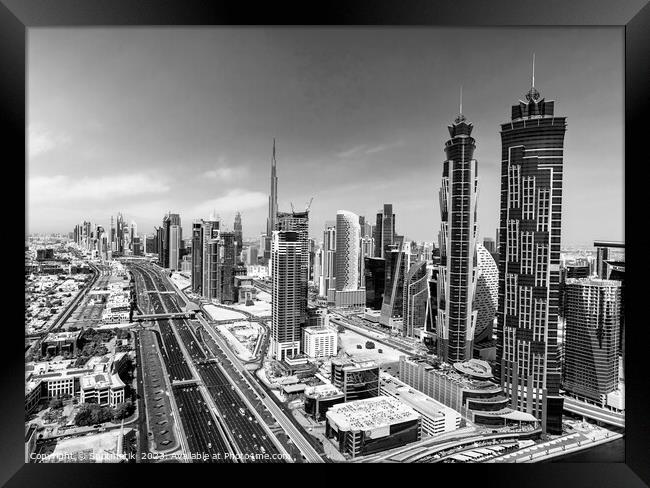 Aerial Dubai city skyscrapers Sheikh Zayed Road Framed Print by Spotmatik 