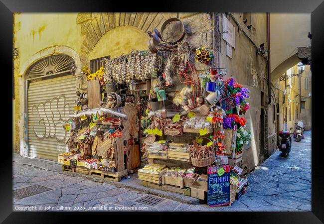 Pavement Shop in Florence Tuscany Italy Framed Print by John Gilham