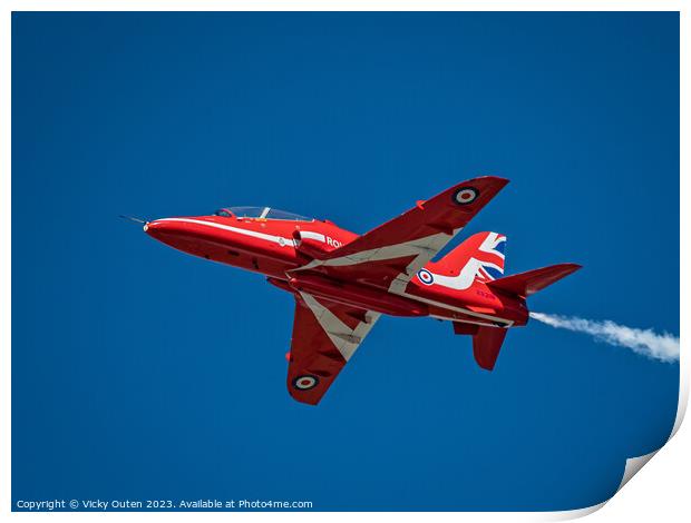 Red arrow flying through a blue sky Print by Vicky Outen