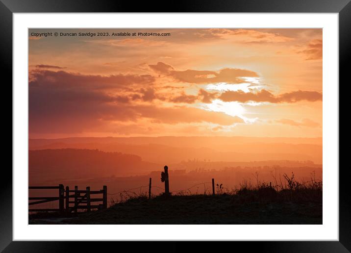 Hazy sunset looking towards the Mendips Framed Mounted Print by Duncan Savidge