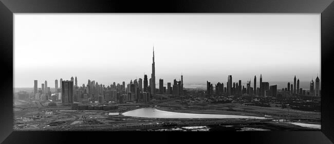 Aerial Panorama Dubai sunset Burj Khalifa  Framed Print by Spotmatik 
