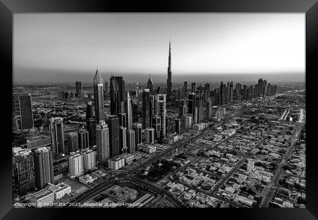 Aerial skyline view of Dubai city skyscrapers UAE Framed Print by Spotmatik 