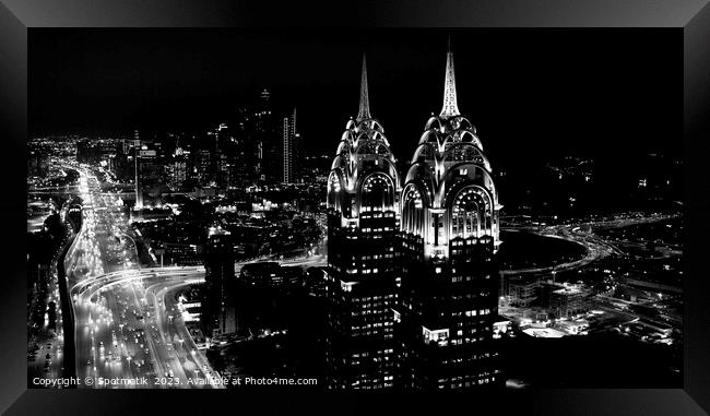 Aerial Dubai night view city Skyline skyscrapers  Framed Print by Spotmatik 