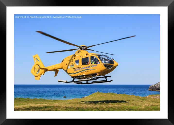 Scottish Ambulance Helicopter Lifting Off Framed Mounted Print by Pearl Bucknall