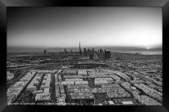 Aerial Dubai sunrise commercial suburbs skyscraper Framed Print by Spotmatik 