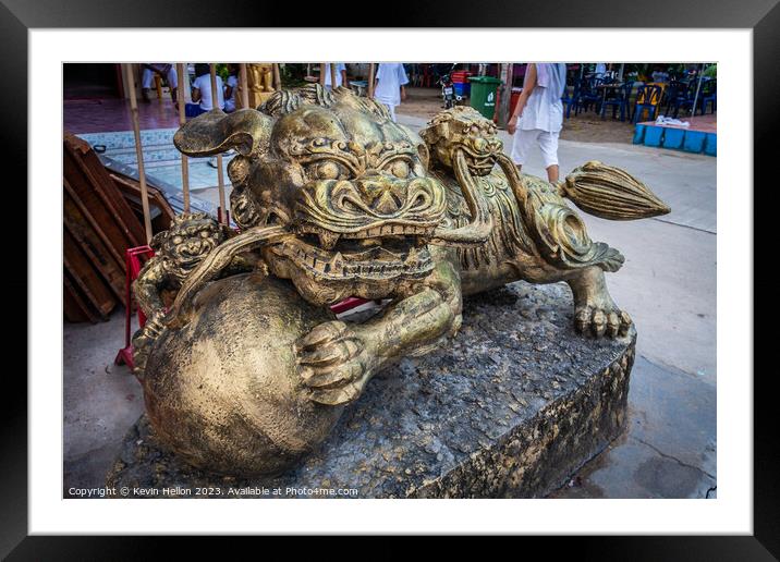 Temple lion, Bangkok, Thailand Framed Mounted Print by Kevin Hellon