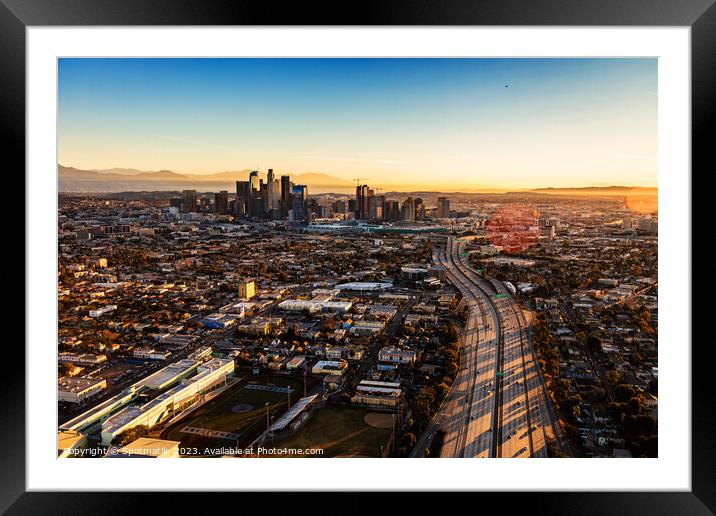 Aerial sunrise view of downtown Los Angeles Freeway  Framed Mounted Print by Spotmatik 