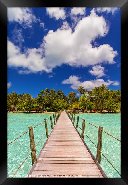 Bora Bora Island jetty in luxury tropical resort Framed Print by Spotmatik 