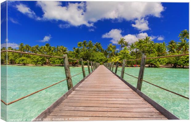 Bora Bora Island jetty in luxury tropical resort Canvas Print by Spotmatik 