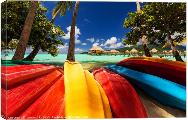 Bora Bora kayak boats Overwater Bungalows tropical lagoon  Canvas Print by Spotmatik 