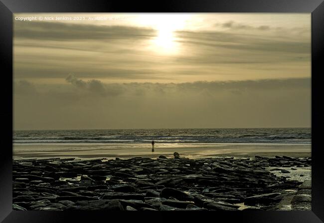 Sun over Dunraven Bay on a winter afternoon  Framed Print by Nick Jenkins