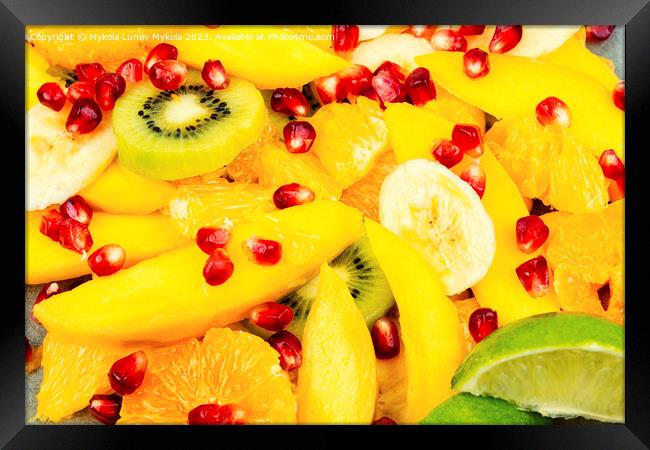 Fruit salad of citrus and berries, food background Framed Print by Mykola Lunov Mykola