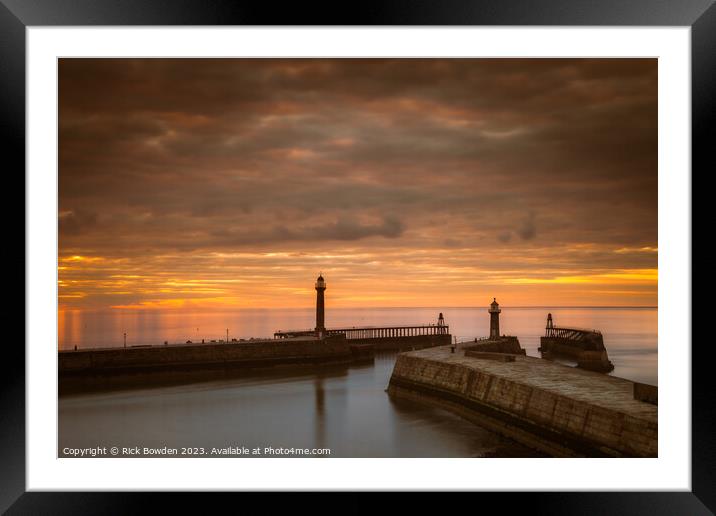 Whitby Pier Sunset Framed Mounted Print by Rick Bowden