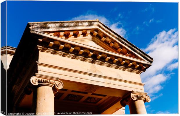 A portico with columns and a triangular pediment on the Greek-st Canvas Print by Joaquin Corbalan
