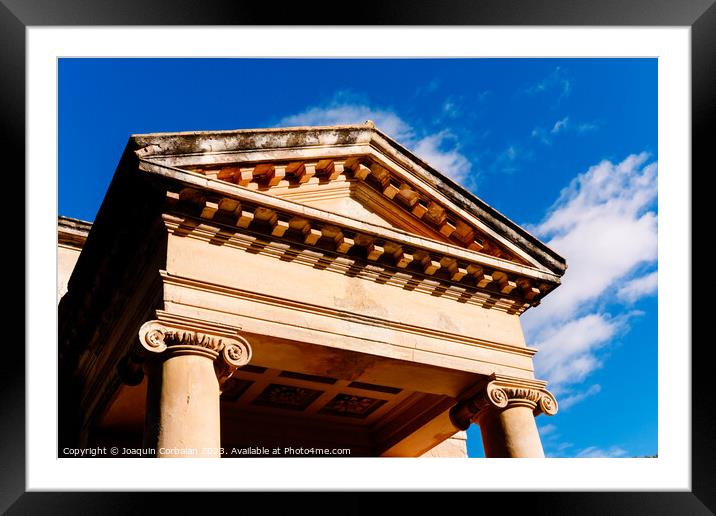 A portico with columns and a triangular pediment on the Greek-st Framed Mounted Print by Joaquin Corbalan
