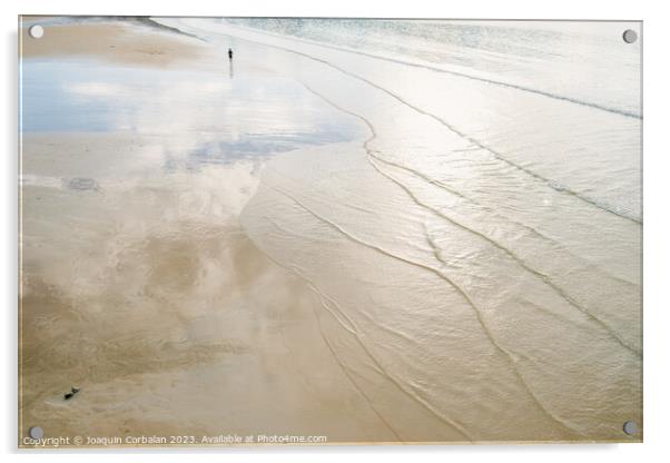 A lone retired person walks away on the sand of a beach in winte Acrylic by Joaquin Corbalan