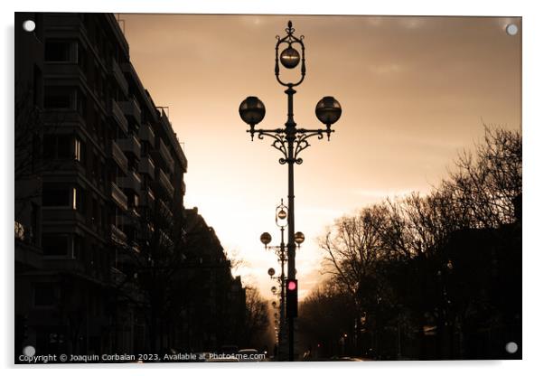 Sunset on a large avenue in a city with lampposts in the middle. Acrylic by Joaquin Corbalan