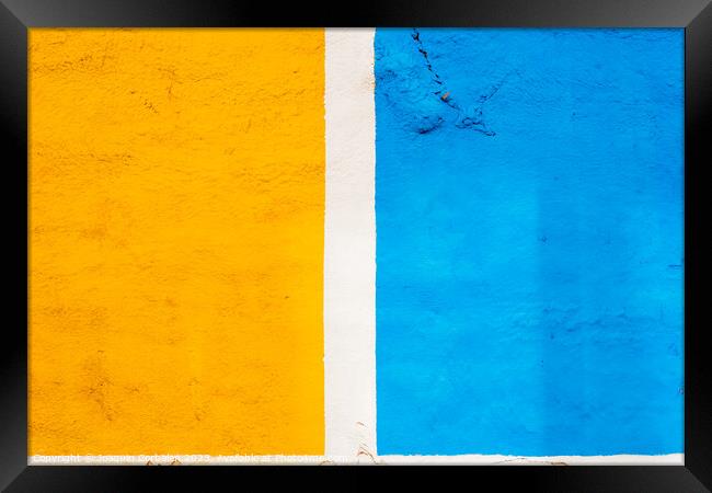 A background painted in two halves of yellow and blue, separated Framed Print by Joaquin Corbalan