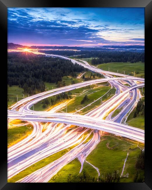 Motorway interchange Framed Print by Roger Mechan