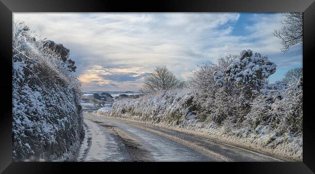 snowy road in cornwall Framed Print by kathy white
