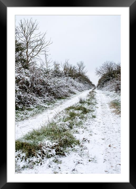 Frozen Tracks Up A Lane In The Oxfordshire Countryside Framed Mounted Print by Peter Greenway