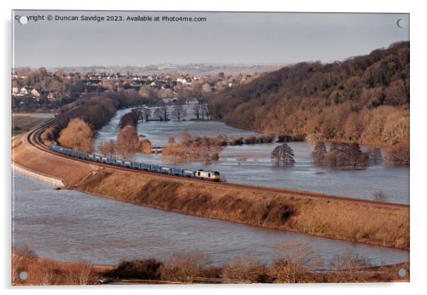 A freight train crosses flooded fields through Corston near Bath Acrylic by Duncan Savidge