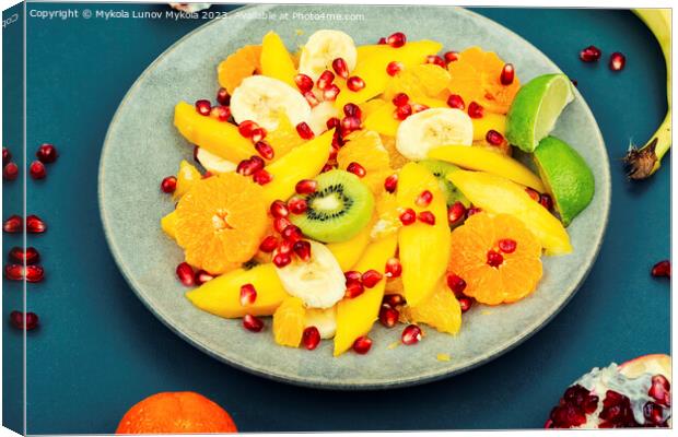Fruit salad of citrus and berries. Canvas Print by Mykola Lunov Mykola