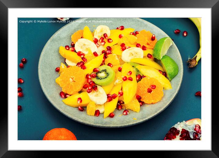 Fruit salad of citrus and berries. Framed Mounted Print by Mykola Lunov Mykola