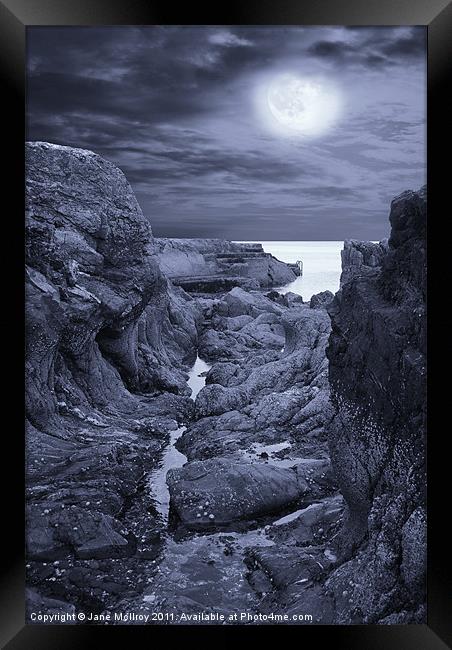 Moonlight over Rugged Seaside Rocks Framed Print by Jane McIlroy